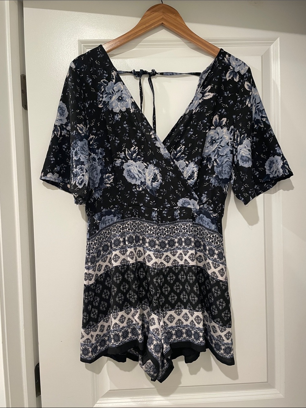 Blue rain blue and black floral romper small